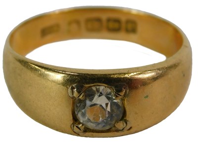 Lot 83 - An 18ct gold and diamond solitaire ring, the...