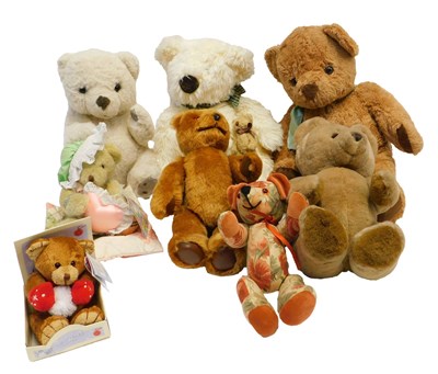 Lot 521 - A group of soft toys, to include Teddy bears,...