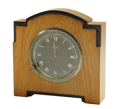 Lot 33 - An Art Deco oak cased eight day mantel clock,...