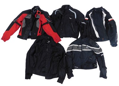 Lot 99 - A group of motorbike jackets, to include Ret...