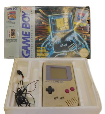 Lot 283 - A Nintendo Game Boy compact game system, boxed,...