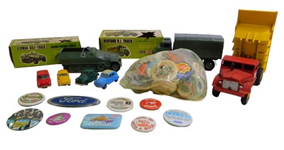Lot 378 - Various toys and badges, including a 5103...