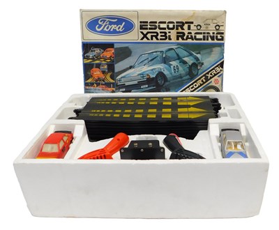 Lot 446 - A Scalextric C676 Ford Escort XR3I Racing slot...