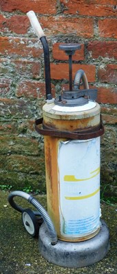 Lot 72 - A Duckhams two stroke oil dispenser, 76cm high.