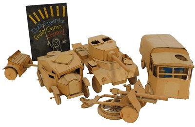 Lot 711 - A collection of cardboard military vehicles,...