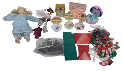 Lot 697 - A Bayko garden set, Polly Pocket doll sets,...