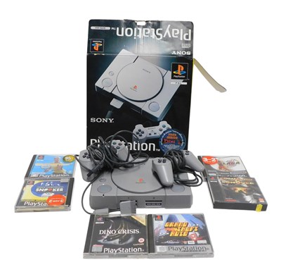 Lot 624 - A Sony PlayStation Model SCPH1002, with a dual...