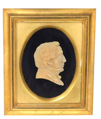 Lot 42 - An early 19thC wax profile portrait of a...