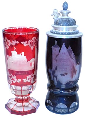 Lot 44 - A 20thC German ruby flash glass vase, engraved...