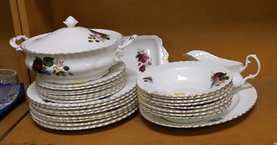 Lot 2024 - A part dinner service with floral decoration,...