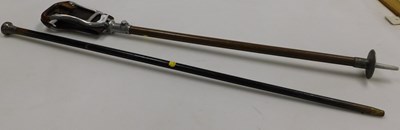 Lot 2035 - A silver topped walking stick, together with a...