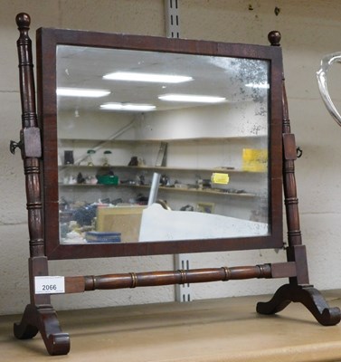 Lot 2066 - A Georgian mahogany toilet mirror, with turned...