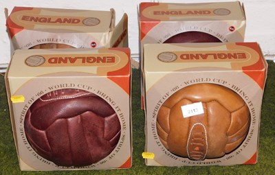 Lot 2113 - Four traditional leather footballs,...