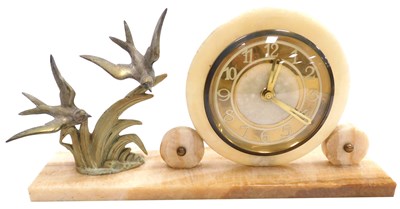 Lot 63 - A French Art Deco marble and metal mantel...