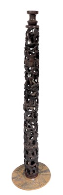 Lot 62 - A 20thC African tribal carved pillar, of four...