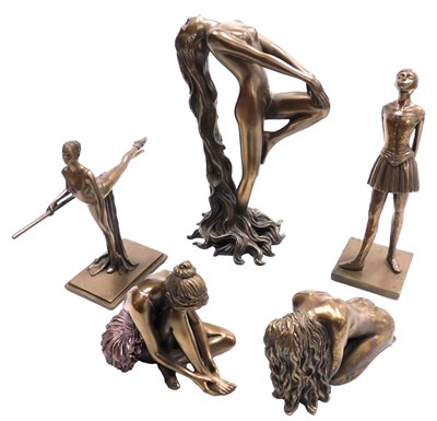 Lot 134 - A group of bronzed plaster figures, including...