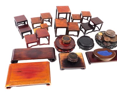 Lot 144 - A group of Chinese hardwood stands, of...
