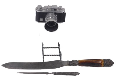 Lot 118 - A Halina 35x camera, Empire Made, a silver...