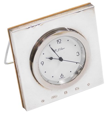 Lot 114 - An Elizabeth II silver mounted strut clock,...