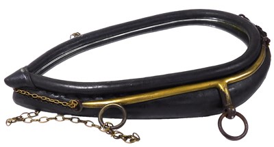 Lot 181 - A leather brass and cast iron horse...