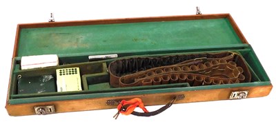 Lot 184 - An early 20thC fabric bound gun case,...