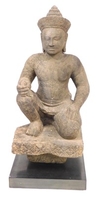 Lot 829 - A Khmer sandstone figure of Varuna, in a...
