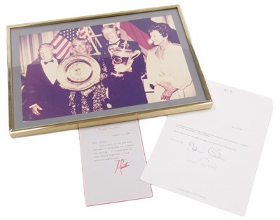 Lot 237 - A photograph of Boris Becker and Martina...