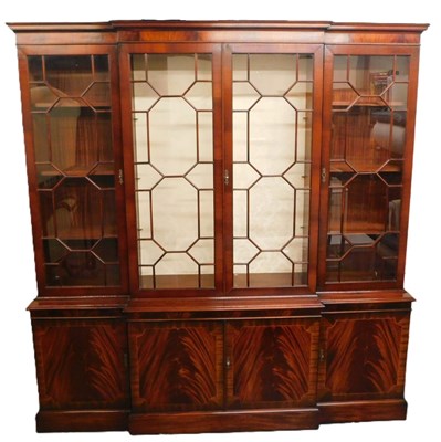 Lot 495 - A Georgian reproduction break front mahogany...