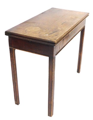 Lot 553 - A George III mahogany fold over tea table,...