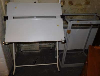 Lot 1003 - An A1 drawing board on frame, a half glazed...