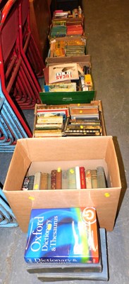 Lot 1050 - A quantity of paperback and hardback books, to...