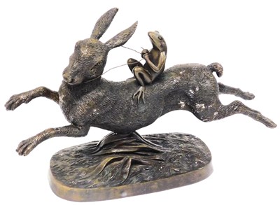 Lot 229 - A 20thC bronzed metal figure group, of a frog...