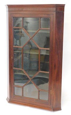 Lot 355 - A George III mahogany corner wall...