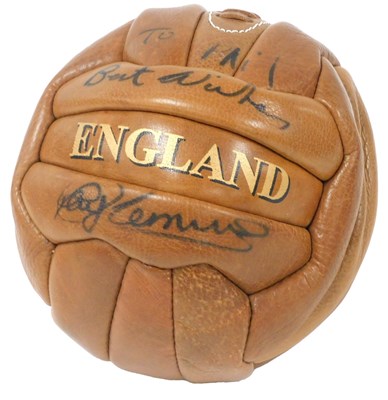 Lot 302 - A stitched leather "England" football, signed,...