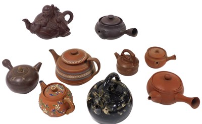 Lot 320 - 19thC and later Yixing teapots, a teapot...