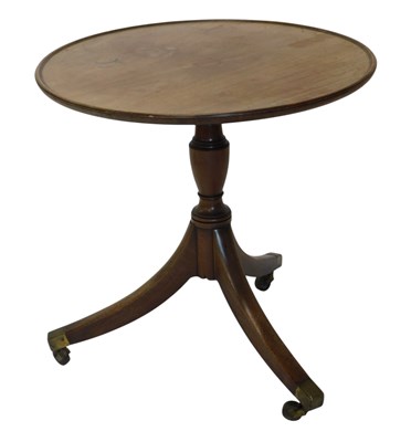 Lot 373 - A mahogany occasional table, the circular top...