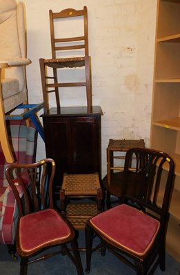 Lot 1021 - A mahogany two door cabinet, raised on...