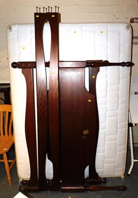 Lot 1022 - A Stag Minstrel mahogany headboard and bed...