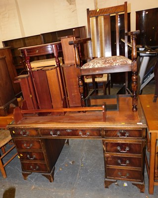 Lot 1032 - An early 20thC oak pedestal desk, with leather...