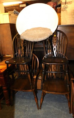 Lot 1042 - Four oak wheel back kitchen chairs, including...
