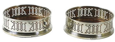 Lot 107 - A pair of Elizabeth II silver coasters,...
