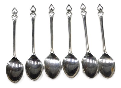 Lot 154 - A set of six George V silver spoons, each with...