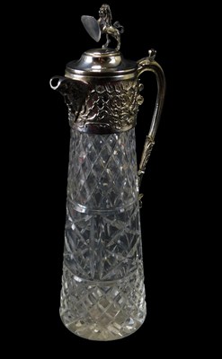 Lot 74 - A cut glass and silver plated claret jug, the...