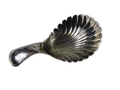 Lot 129 - A George III silver caddy spoon, with a shell...