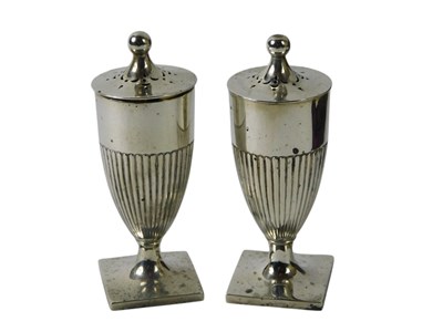Lot 110 - A pair of Victorian silver pepper pots, of urn...