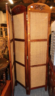 Lot 1047 - A three panel dressing screen, carved hardwood...