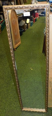Lot 2173 - A rectangular gilt framed wall mirror, with...