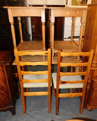 Lot 1051 - A pine kitchen table with two pine ladder back...