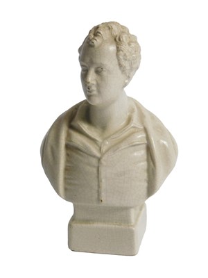 Lot 32 - A 19thC white glazed pottery bust of Lord...