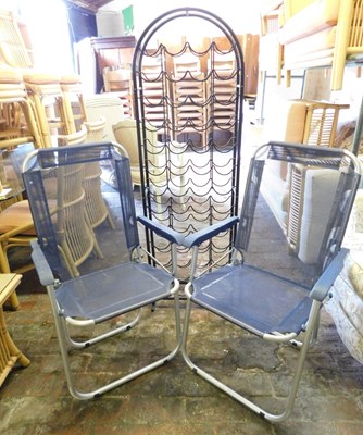 Lot 1090 - A metal wine rack, together with two folding...